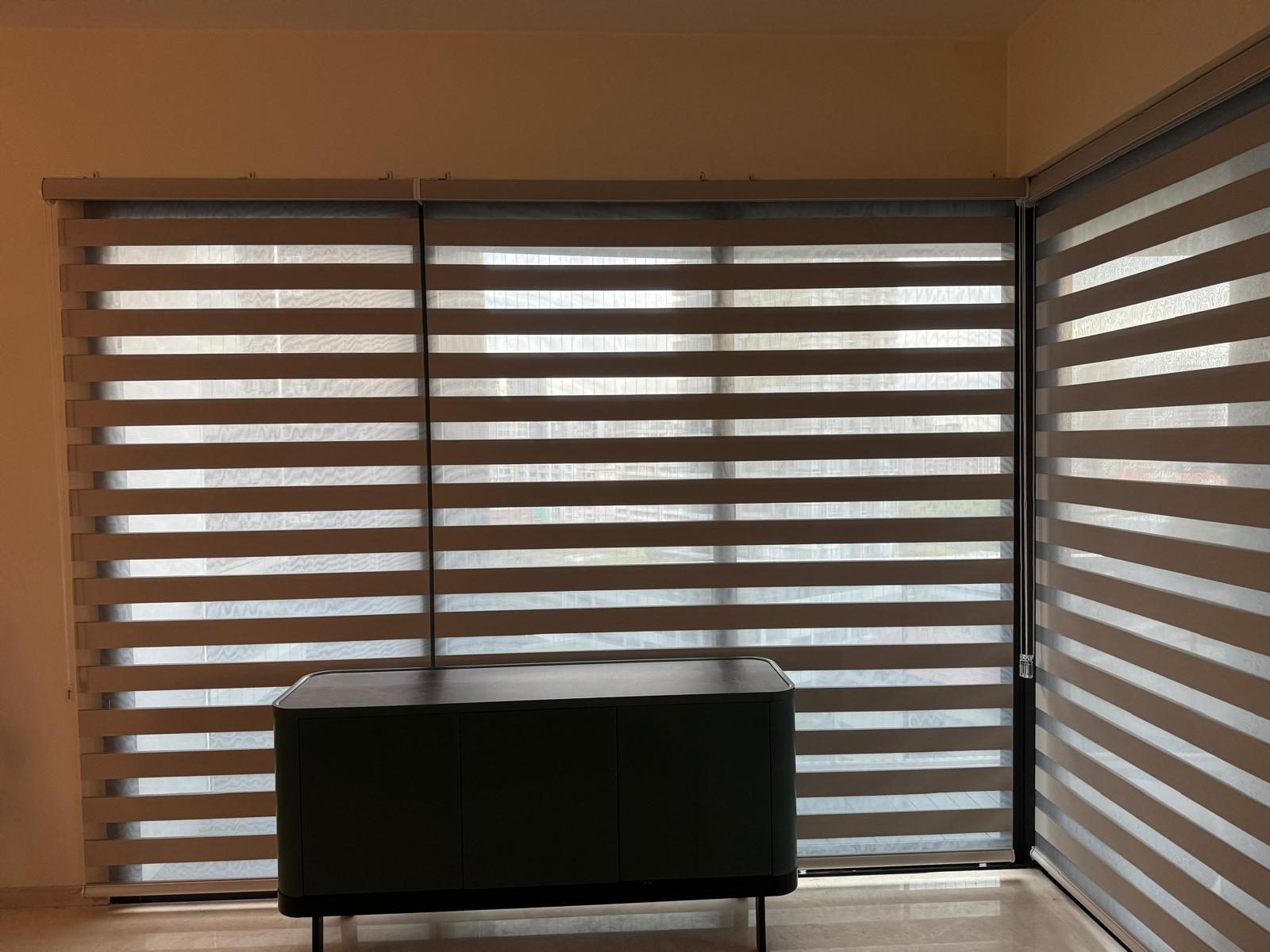 White sheer curtains diffusing the daylight in a living room