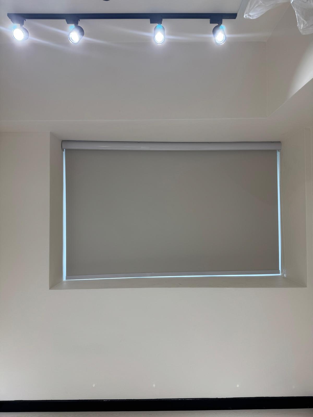 White Venetian blind finished with dark ladder tapes