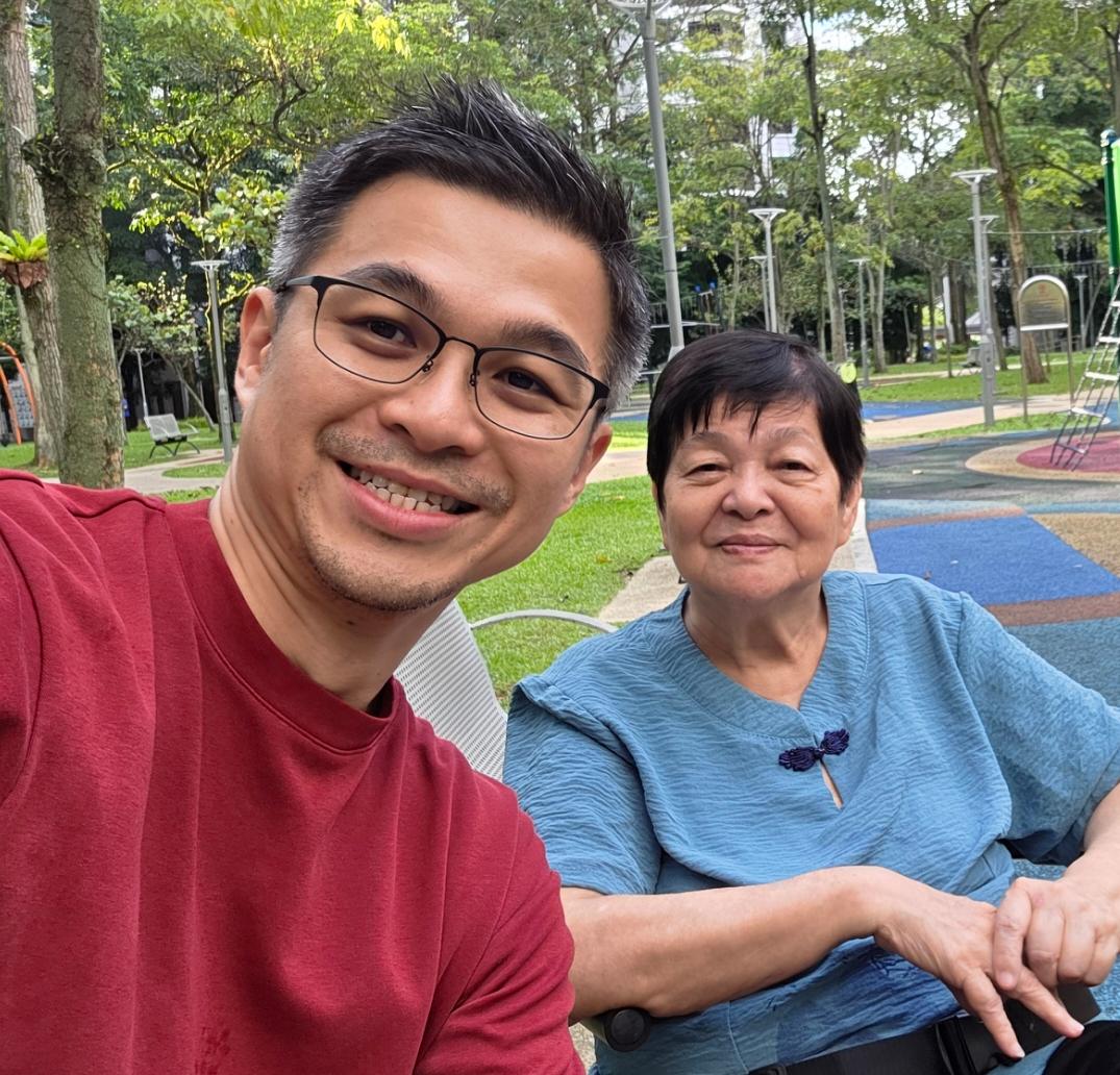 Two family members at a playground